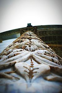 Low angle view of statue against building