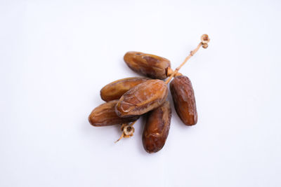 High angle view of bread against white background