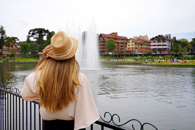 Stylish young woman visiting gramado town, serra gaucha, rio grande do sul, brazil.