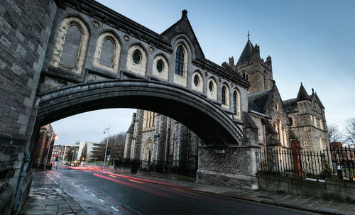 Road passing through city buildings