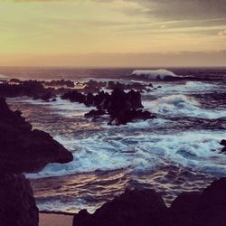 Scenic view of sea against sky during sunset