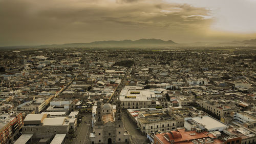 High angle shot of townscape against sky