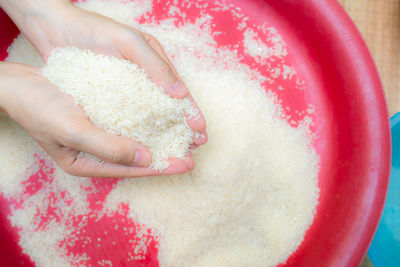 High angle view of hand holding food