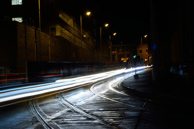 Light trails on road at night