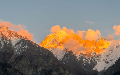 Scenic view of snowcapped mountains against sky during winter