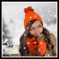 Portrait of a smiling woman in snow