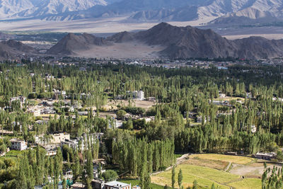 Scenic view of landscape and mountains against sky