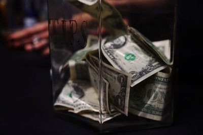 Close-up of telephone booth on table
