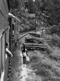 Woman standing on grass