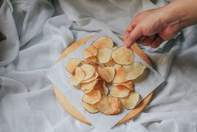 High angle view of person preparing food on table