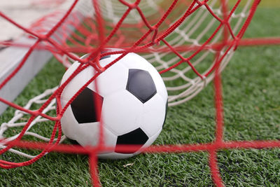 Soccer ball by net