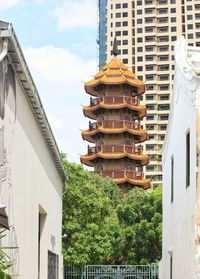 Low angle view of buildings against sky