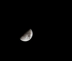 Low angle view of moon against sky at night