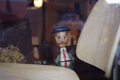 Close-up of wooden figurine