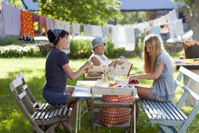 Family having meal in garden