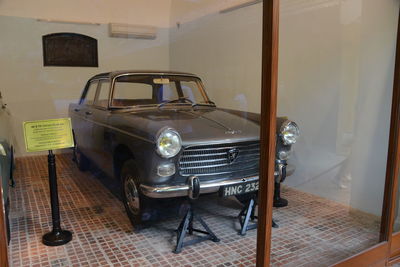 Vintage car on table in building