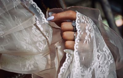 Close-up of woman holding umbrella