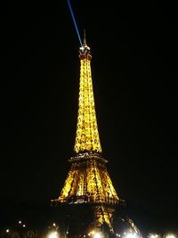 Low angle view of illuminated city at night