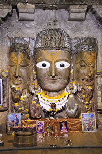 Close-up of buddha statue in temple