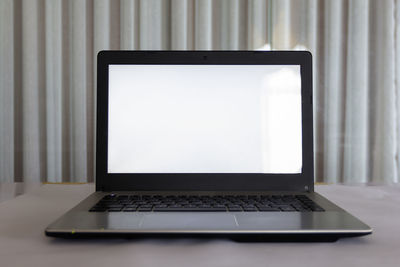 Low angle view of laptop on table