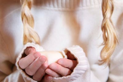 Close-up of woman holding hands