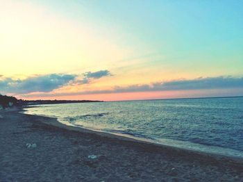Scenic view of sea at sunset