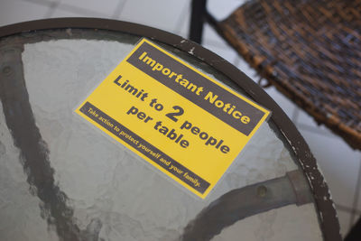 High angle view of information sign on snow