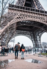 People walking on bridge