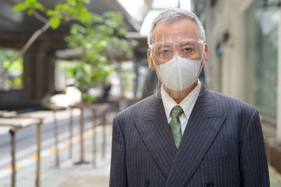 Portrait of man wearing mask