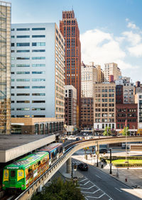 Road in city against sky