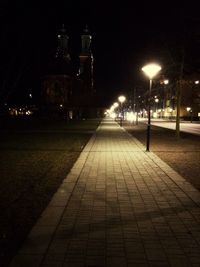 Illuminated street lights at night