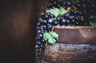 Close-up of grapes growing on table