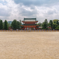 Built structure against cloudy sky