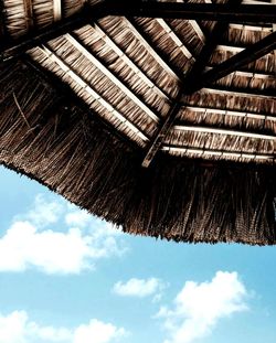 Low angle view of roof against sky