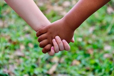 Close-up of hand holding hands