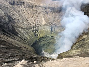 Smoke emitting from volcanic mountain