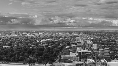 Aerial view of cityscape against sky
