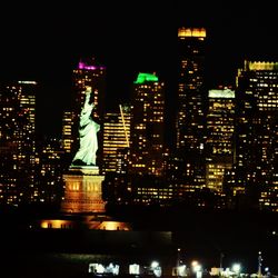 Illuminated buildings in city at night