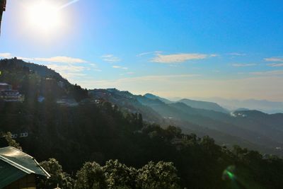 Scenic view of mountains against sky at sunset