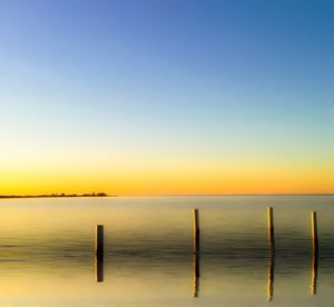 Scenic view of pier over sea