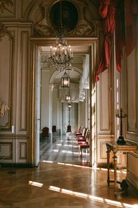 Illuminated chandelier in building