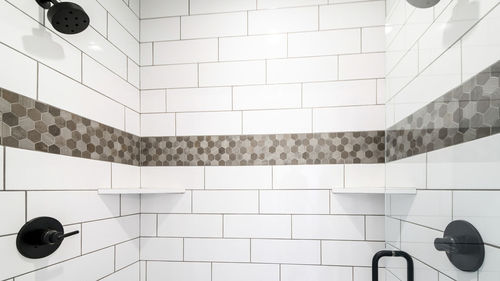 Low angle view of illuminated lights on tiled floor