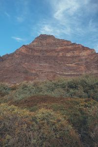 Scenic view of rocky mountains against sky