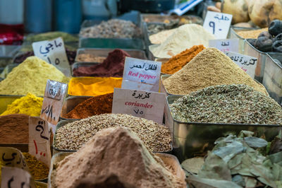 Variety of spices for sale at market stall