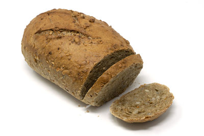 High angle view of bread against white background