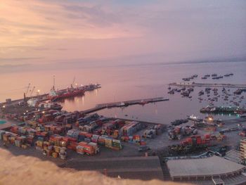 View of harbor at sunset