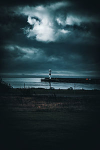 Scenic view of sea against sky at dusk