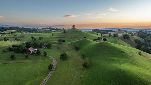 Scenic view of landscape against sky during sunset