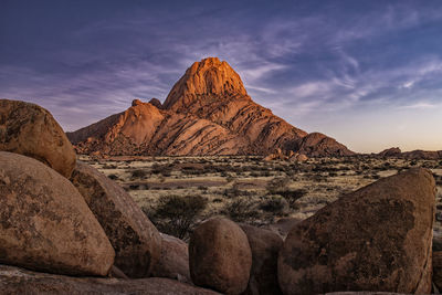 Scenic view of mountains against sky during sunset