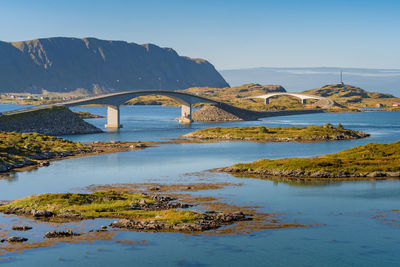 Bridge over sea against sky